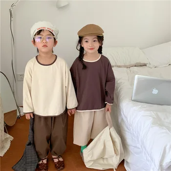 2023 m. pavasario nauji korėjietiški vaikiški marškinėliai laisvomis rankovėmis ilgomis rankovėmis berniukams ir mergaitėms su surištais madingais marškinėliais apvaliu kaklu - Nuotrauka 1  
